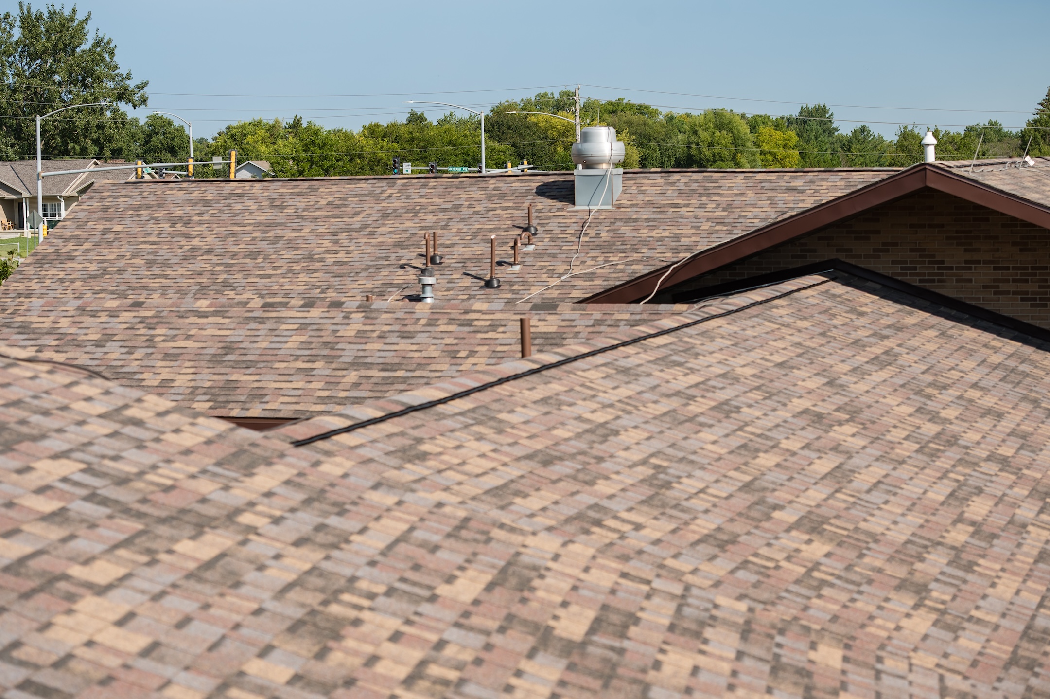 brown asphalt shingle install