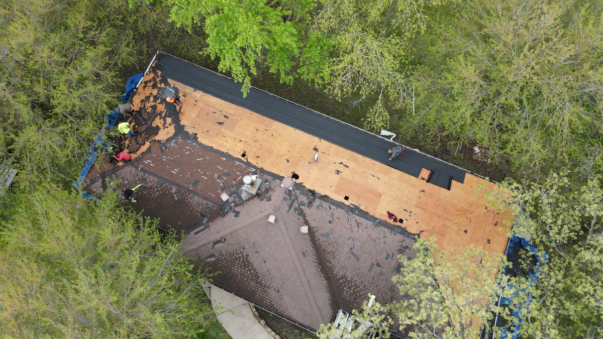 Roof replacement in progress by First Fruits