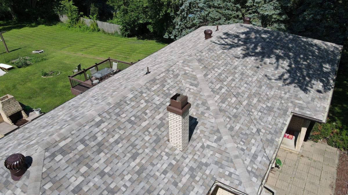 Aerial view of a light grey shingle roof